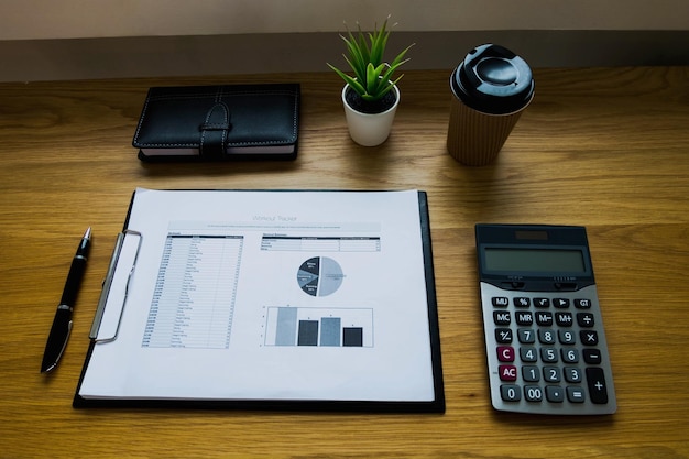 A calm workspace with a notebook and a simple budget overview
